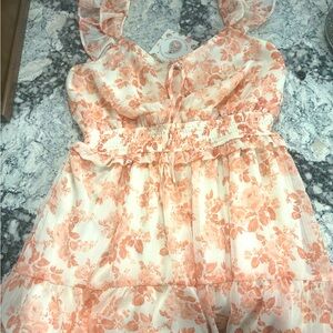 Beautiful feminine ruffle sheer floral romper